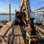 new seawall install machinery wrightsville beach nc